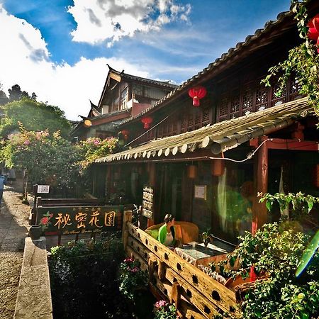 Отель Secret Garden Лицзян Номер фото